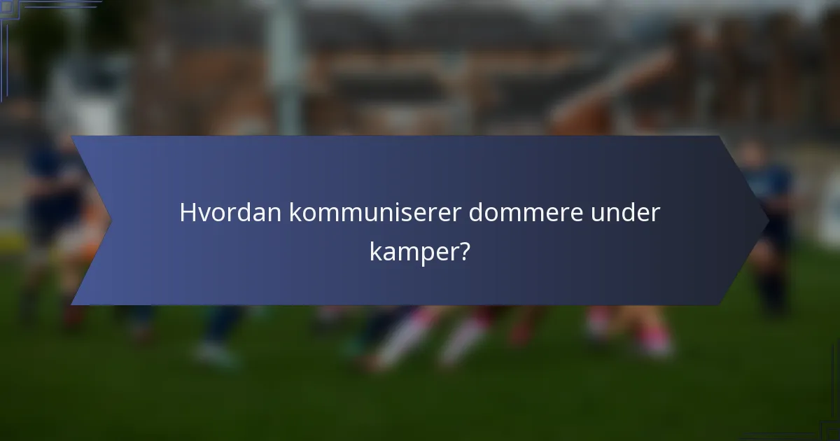 Hvordan kommuniserer dommere under kamper?